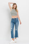 Mid Rise Distressed Cropped Flare Jeans